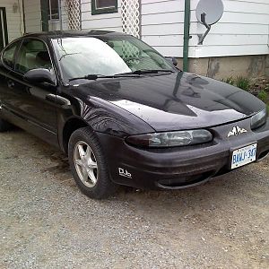 First car and soon to be winter car..  :)
Just bought VHT Nightshade last week and tinted my lights.
2 10" Subs, that fill whole trunk, Amp, Deck, P