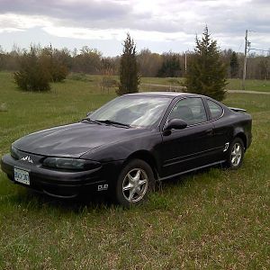 First car and soon to be winter car..  :)
Just bought VHT Nightshade last week and tinted my lights.
2 10" Subs, that fill whole trunk, Amp, Deck, P